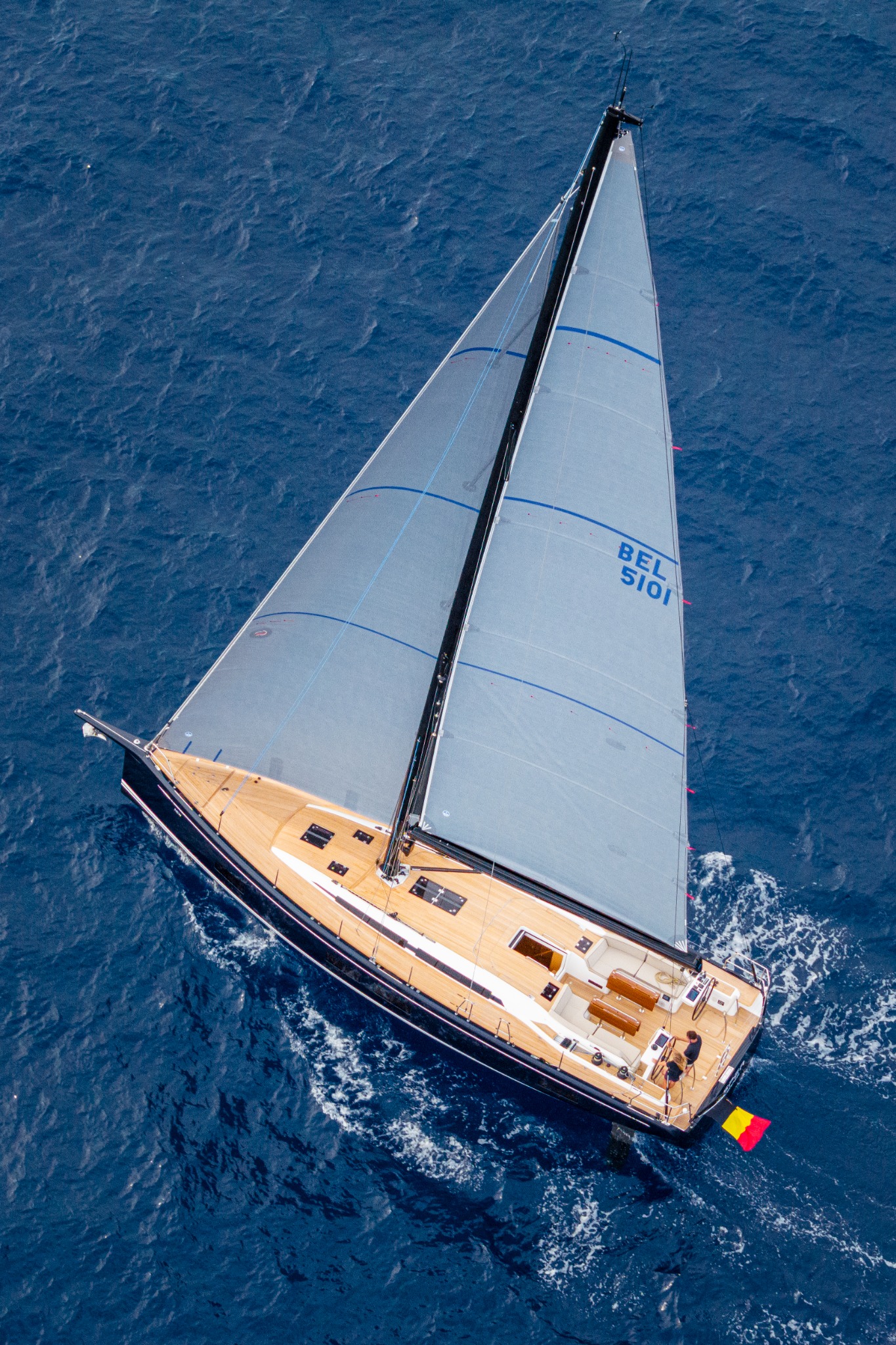 Sailing yacht underway on the open sea, viewed from above